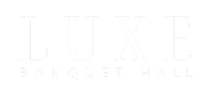 A white logo with a sun shining through it on a white background.